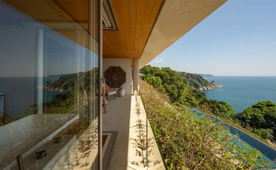 Bedroom 4 balcony above the pool and coastline