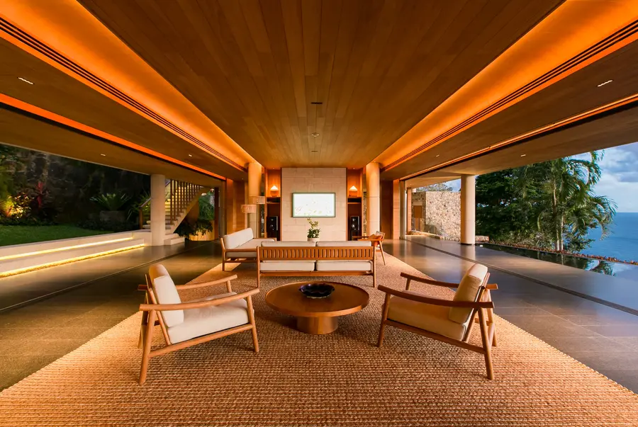 Living room with timber ceiling, open on both sides