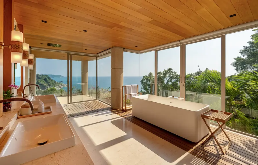 Master bathroom with freestanding bathtub and sea view