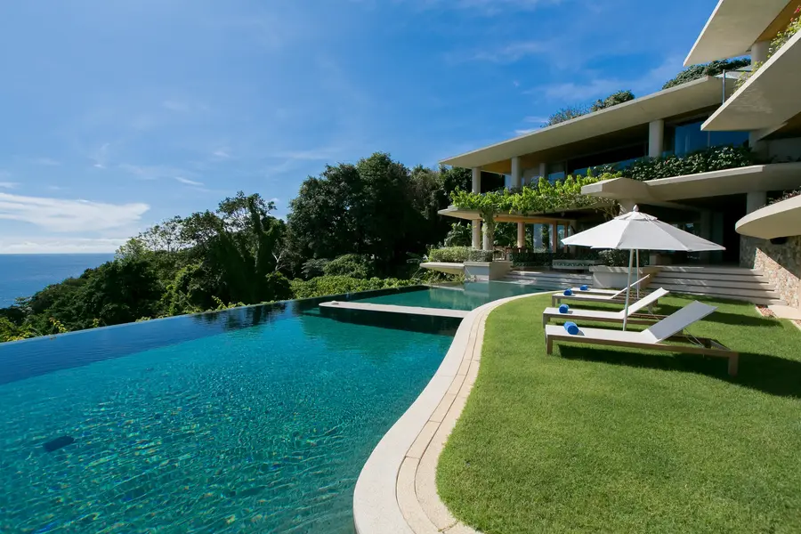 Sun lawn and loungers beside the pool