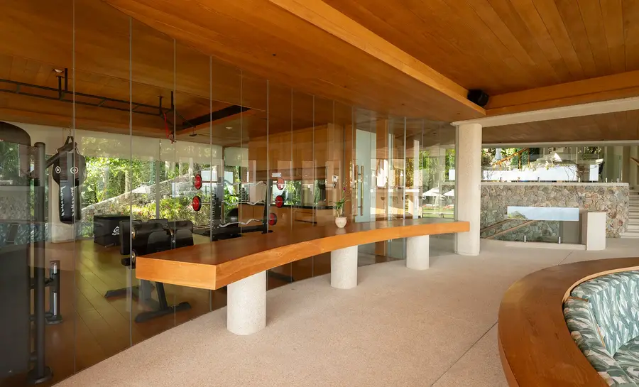 Sala lounge beside the glass-walled gym