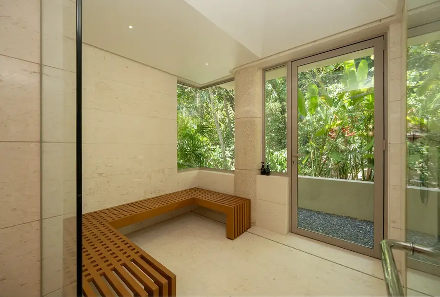 Steam room with teak bench
