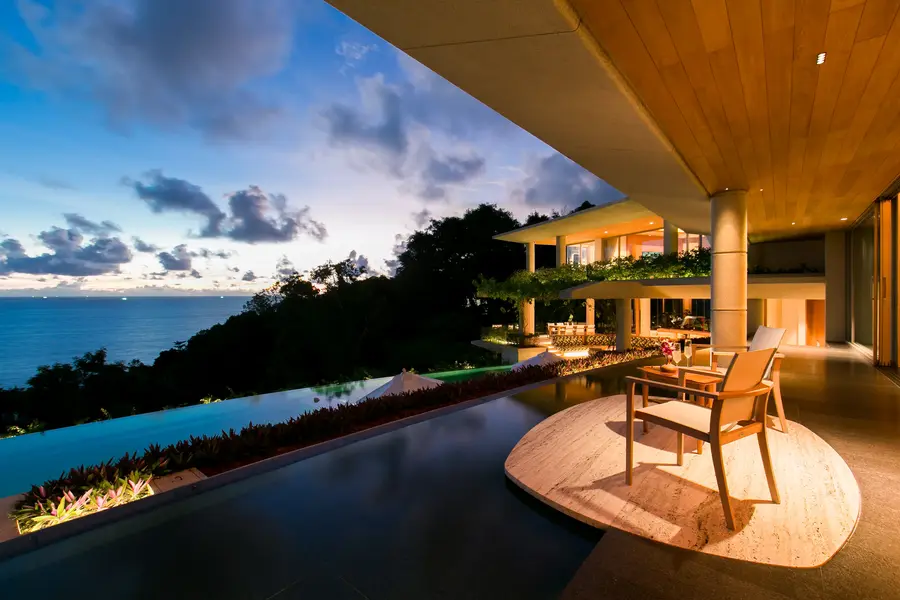 Terrace seating over the water at twilight
